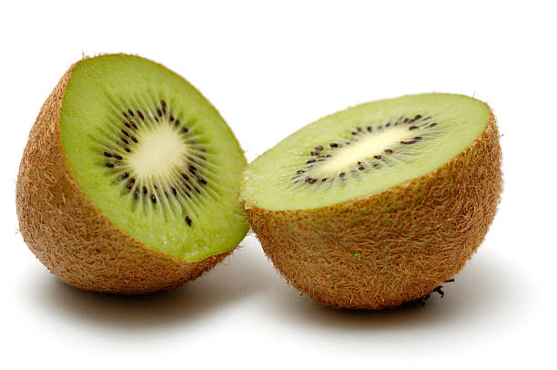 istock halved kiwi fruit against white background 90162136