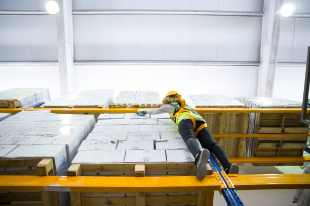 women with safety harness in warehouse