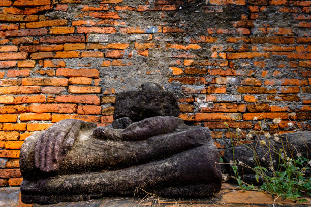 istock Ancient Buddha ruins and old brick wall on ancient monuments that are over 200 years old. Wat Nakhon Luang Tample,Prasat Nakhon Luang public domain or treasure of Buddhism in Nakornluang, Ayutthaya, Thailand 901627144
