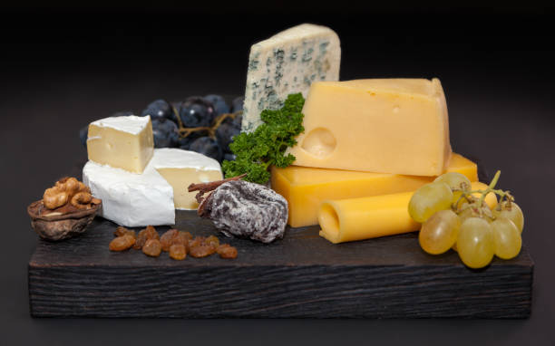 istock Different kinds of cheeses and grapes 901630074