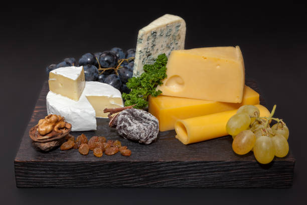 istock Different kinds of cheeses and grapes 901630094