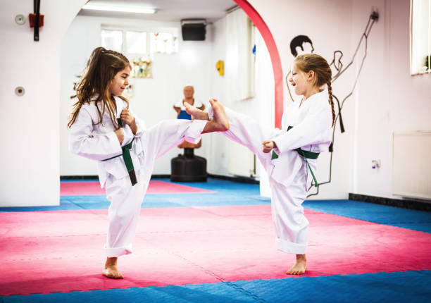 istock Cute girls on Taekwondo training 901635646