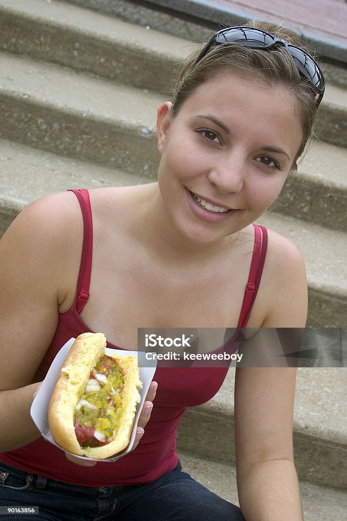 Perrito caliente chica - Foto de stock de Comer libre de derechos