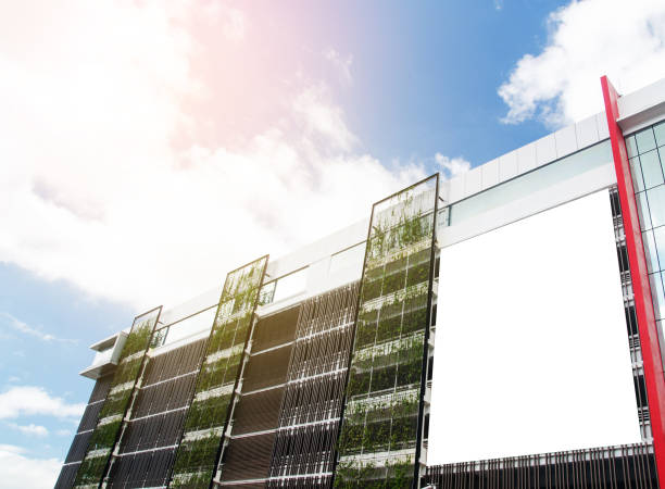 Blank big billboard at office building. steel wall ,glass wall
