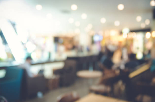 istock Blurred background made with Vintage Tones,Coffee shop blur background with bokeh and working man in cafe 901639260