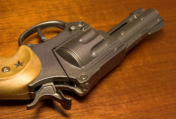istock Toy revolver cocked 90164207