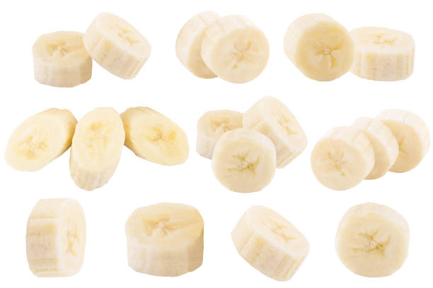 istock Set of freshly slices bananas isolated on white 901642110