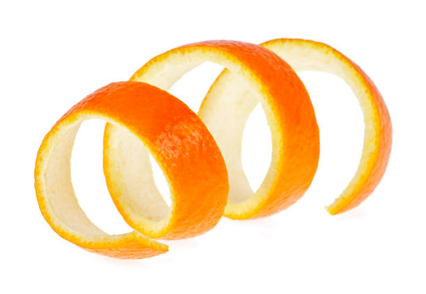 istock Spiral orange peel on a white background 901642780