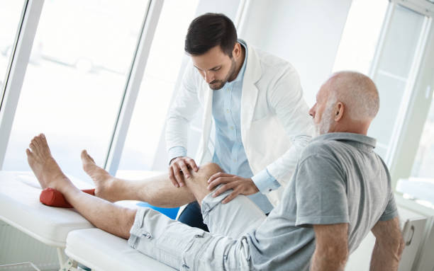 istock Senior man having medical exam. 901643136