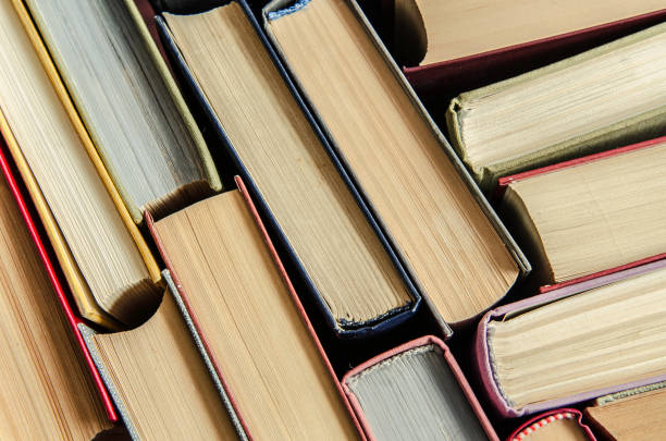 istock a stack of colorful books in a library 901643406