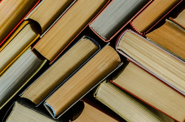istock a stack of colorful books in a library 901643418