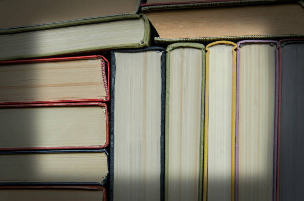 istock a stack of colorful books in a library 901643424