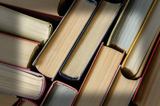 istock a stack of colorful books in a library 901643426