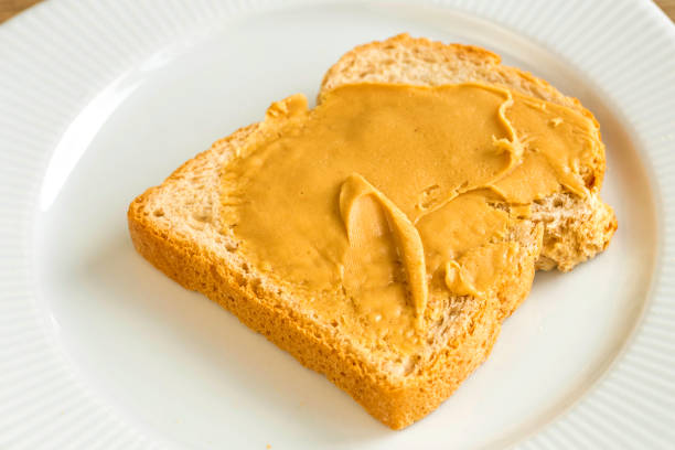 istock Slice of peanut butter cream bread. 901643912