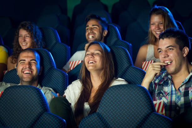 istock People watching a movie in a cinema 901643974
