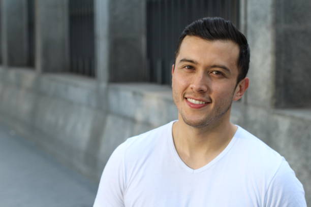 istock Suave male smiling portrait isolated with copyspace 901643984