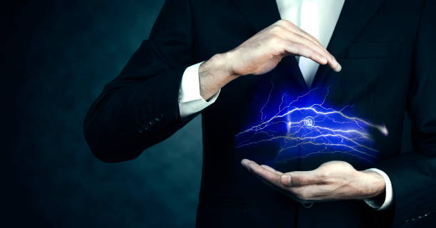 istock Man hand electric strike of lightning 901649956
