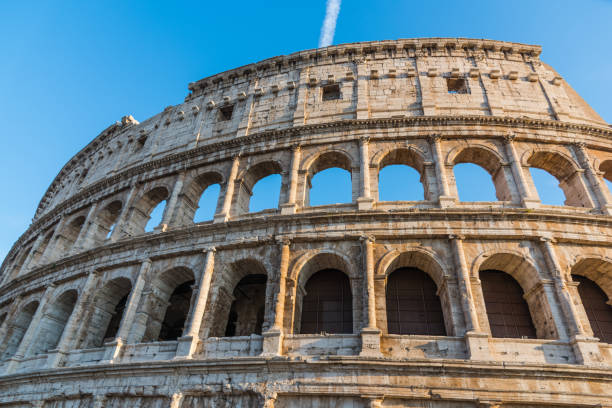 istock World famous Coliseum under a blue sky 901654512