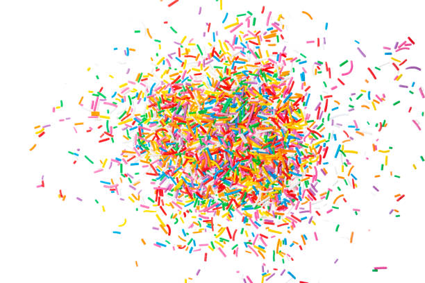 istock Sugar sprinkle dots hearts, decoration for cake and bakery, as a background. Isolated on white. 901654780