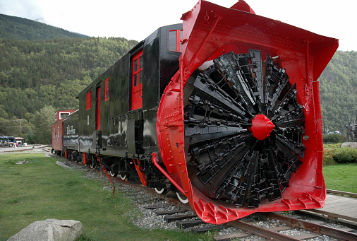 This snowplow is located in Skagway,Alaska.Built in 1898 during the Klondike Gold Rush, it was pushed by two locomotives to clear the snow drifts from the tracks on the White Pass and Yukon Route.