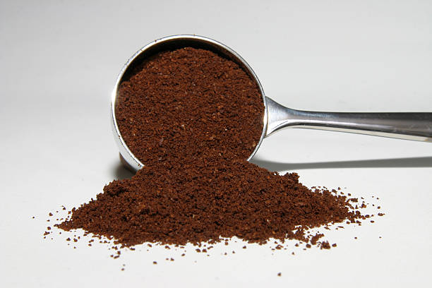 Spoon with coffee powder stock photo