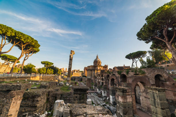 istock World famous Imperial Fora in Rome at sunset 901657520