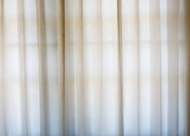 istock Room window with colorful striped curtains, close up 901658616