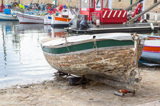 istock Old boat in the port 901659716
