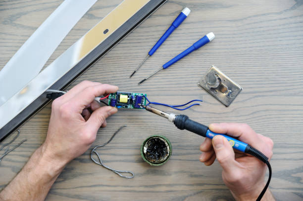 istock Repairing the power supply. 901662868
