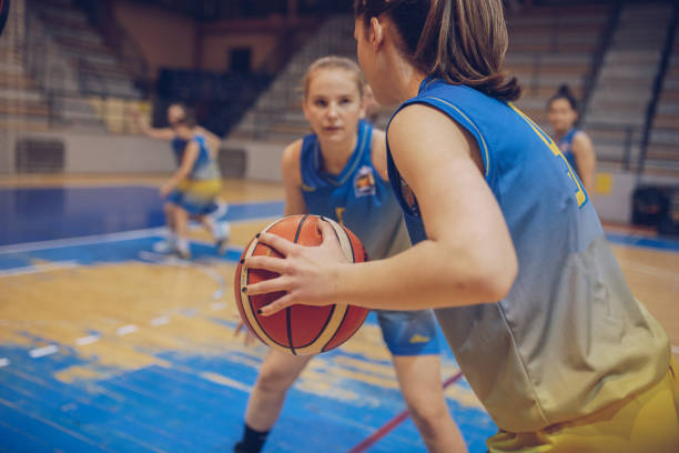 istock Female Basketball Team Playing Game 901665634