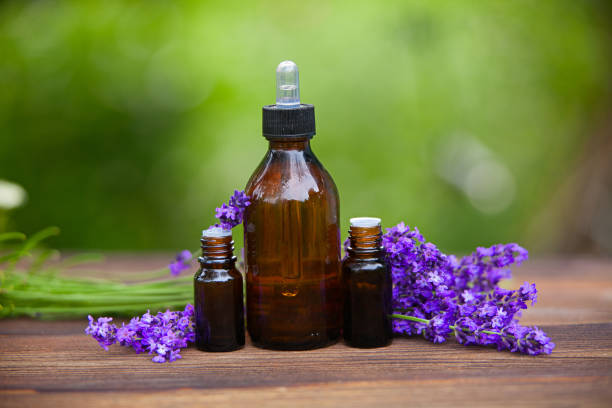 istock lavender essential oil in  beautiful bottle on table 901668986
