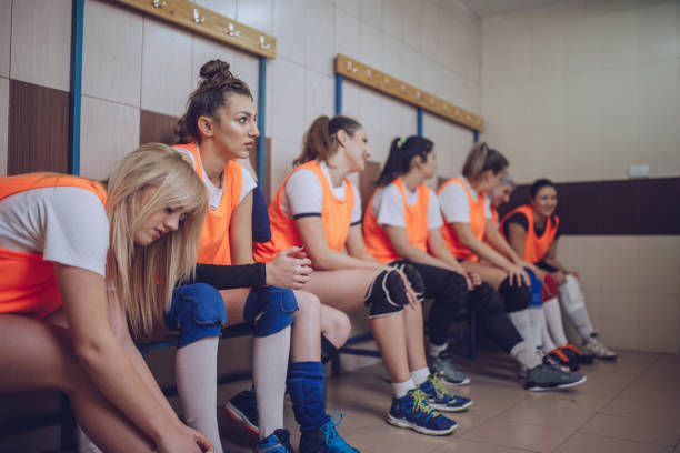 istock Volleyball team sitting in the locker room 901669108