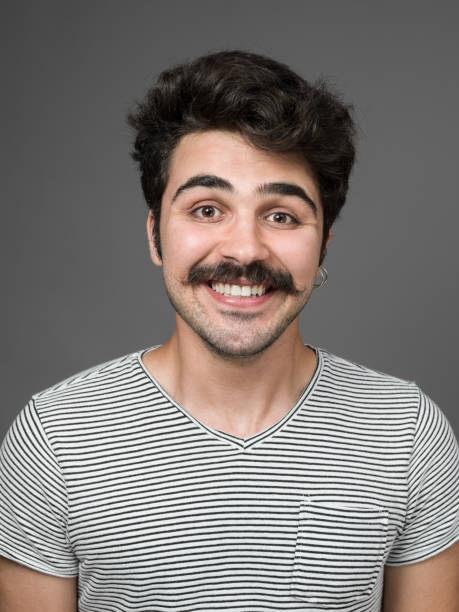 istock Mugshot Of Young Man Making A Face 901669730