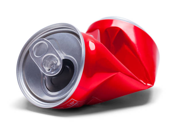 Red Crushed Soda Can Empty Smashed Soda Pop Can Isolated on White Background. drink can photos stock pictures, royalty-free photos & images