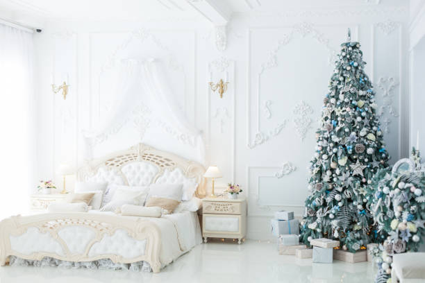 istock Christmas tree in the room 901674042