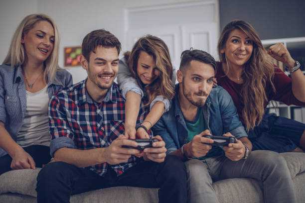 istock Friends playing video games 901677822