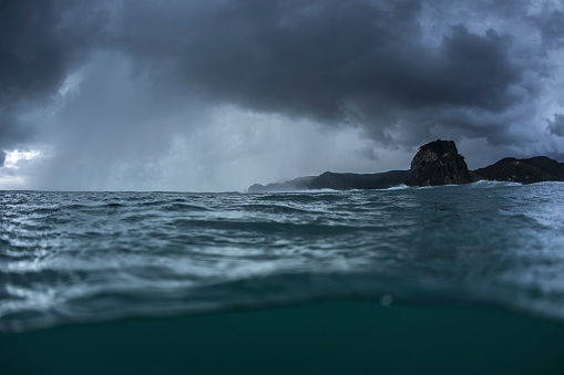 a storm front moves down the coast at Piha Beach on Auckland's west Coast. New Zealand