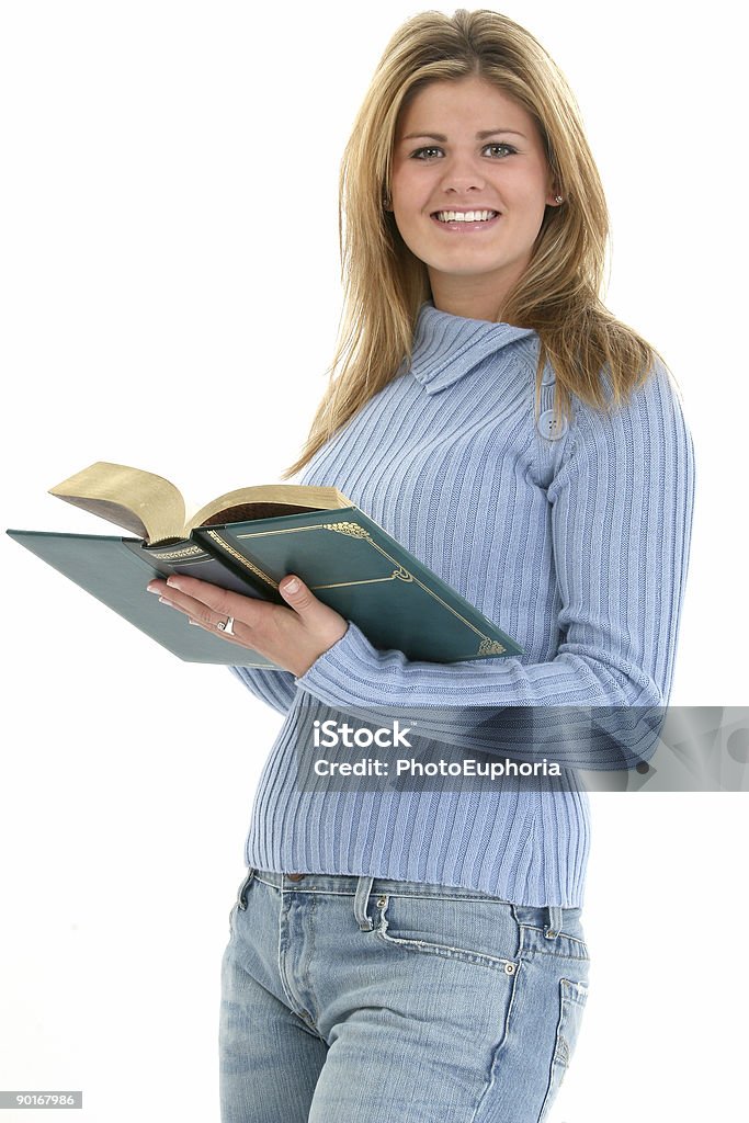 Hermosa mujer joven con libro - Foto de stock de 16-17 años libre de derechos