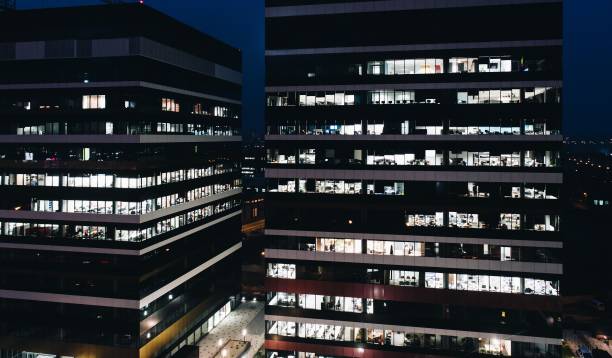 istock Corporation office buildings at night. 901680814