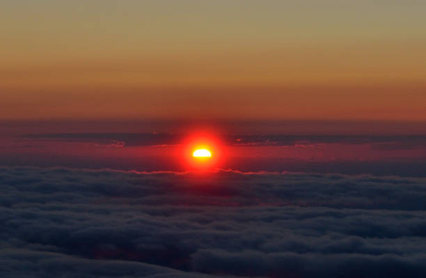 istock Arial view of the sunset over the clouds. 901681756