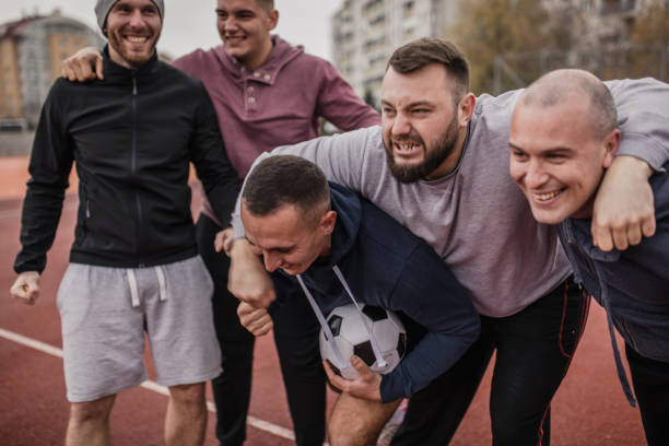 istock Celebrating victory on a football playing field 901689492