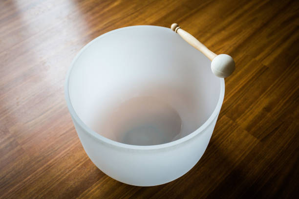 Big crystal singing bowl solo close up Big crystal singing bowl solo close up roots music stock pictures, royalty-free photos & images