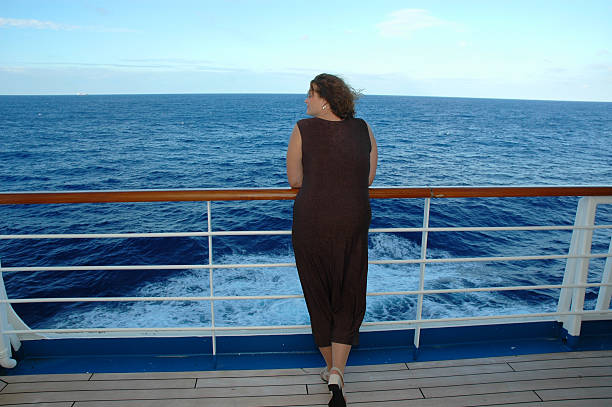 Woman on Cruise Ship stock photo
