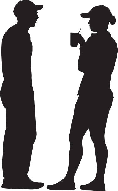 Standing Couple Talking Silhouette Vector silhouette of a youg couple talking to each other. sideways baseball hat stock illustrations