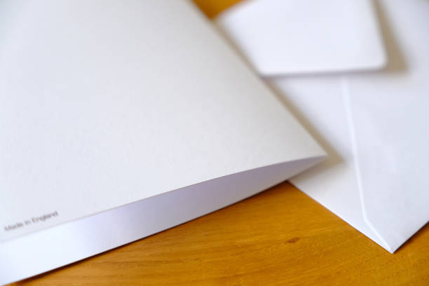 istock Back of a blank white greeting card and an envelope, made in England 901690020