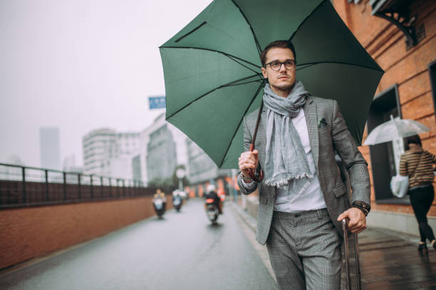 istock Travel man with suitcase 901694430