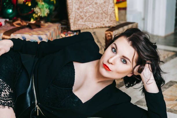 istock Young beautiful woman in black suit 901704398