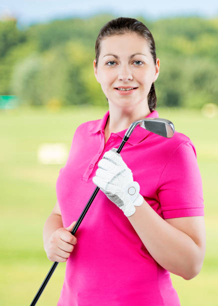 istock Happy successful golfer posing on a background of golf courses 901709546