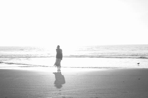 istock Woman relaxing in the beach 901719114