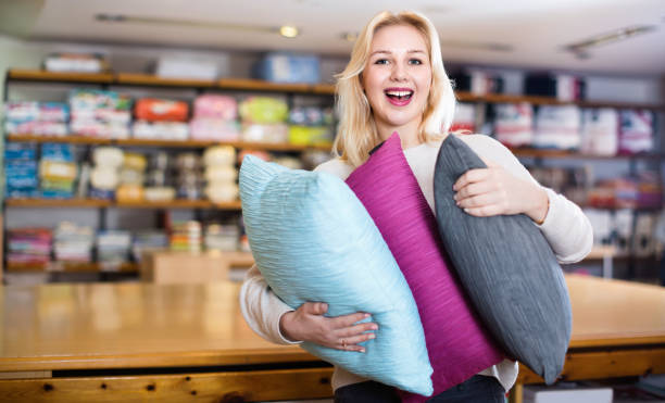 istock Young female customer boasting purchased home textiles 901722508